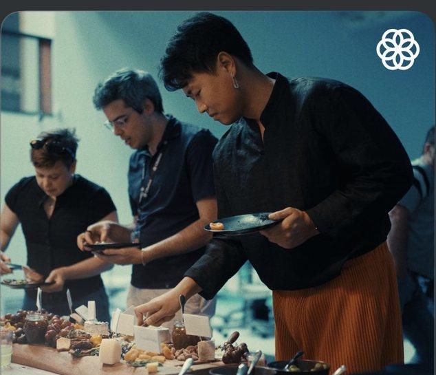 Guests at a Luma-hosted dinner event